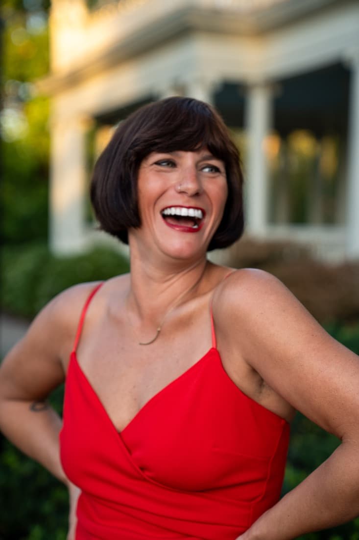 A Here Realty agent laughing
